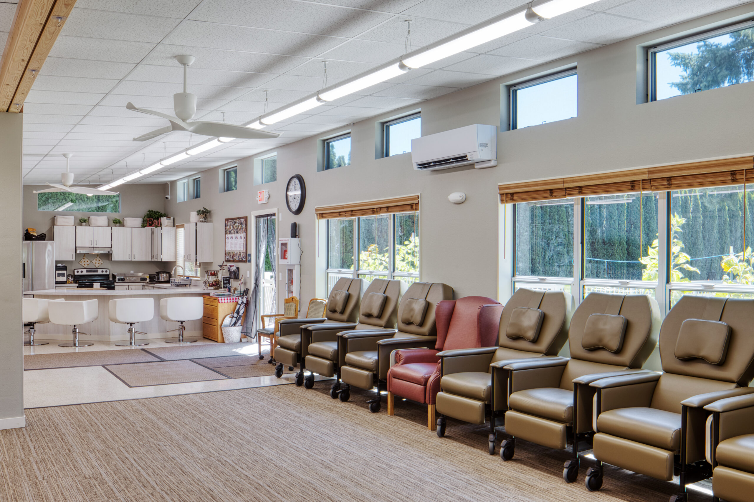 Bright interior of the Sunshine Club SAGE modular building with natural daylight and comfortable spaces for dementia respite care