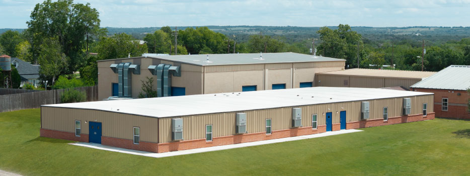 Permanent modular school building designed and constructed by Pacific Mobile Structures for Westhoff ISD, showcasing
